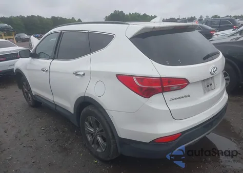 2014 Hyundai Santa Fe Sport 2.4L z USA, uszkodzony, nr VIN 5XYZUDLB7EG219362